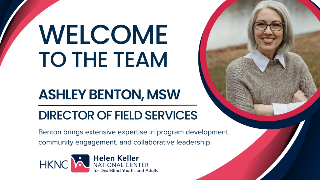 graphic welcoming Ashley Benton as the new Director of Field Services at HKNC. Ashley is pictured in the graphic described as a white woman with platinum, chin-length hair and glasses smiling confidently at the camera with her arms crossed and tucked in front of her. She is wearing a white blouse with a tan parka sweater over it.