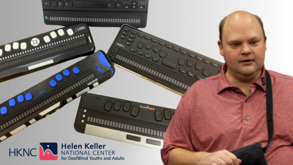 The photo shows several braille displays arranged diagonally across the left side of the image against a light grey background. On the right side of the image is Scott Davert, the Coordinator of the Technology, Research, and Innovation Center (TRIC) at Helen Keller National Center. Scott is wearing a coral-colored polo shirt with thin stripes and has a black strap visible across his shoulder. At the bottom left of the image is the HKNC logo.